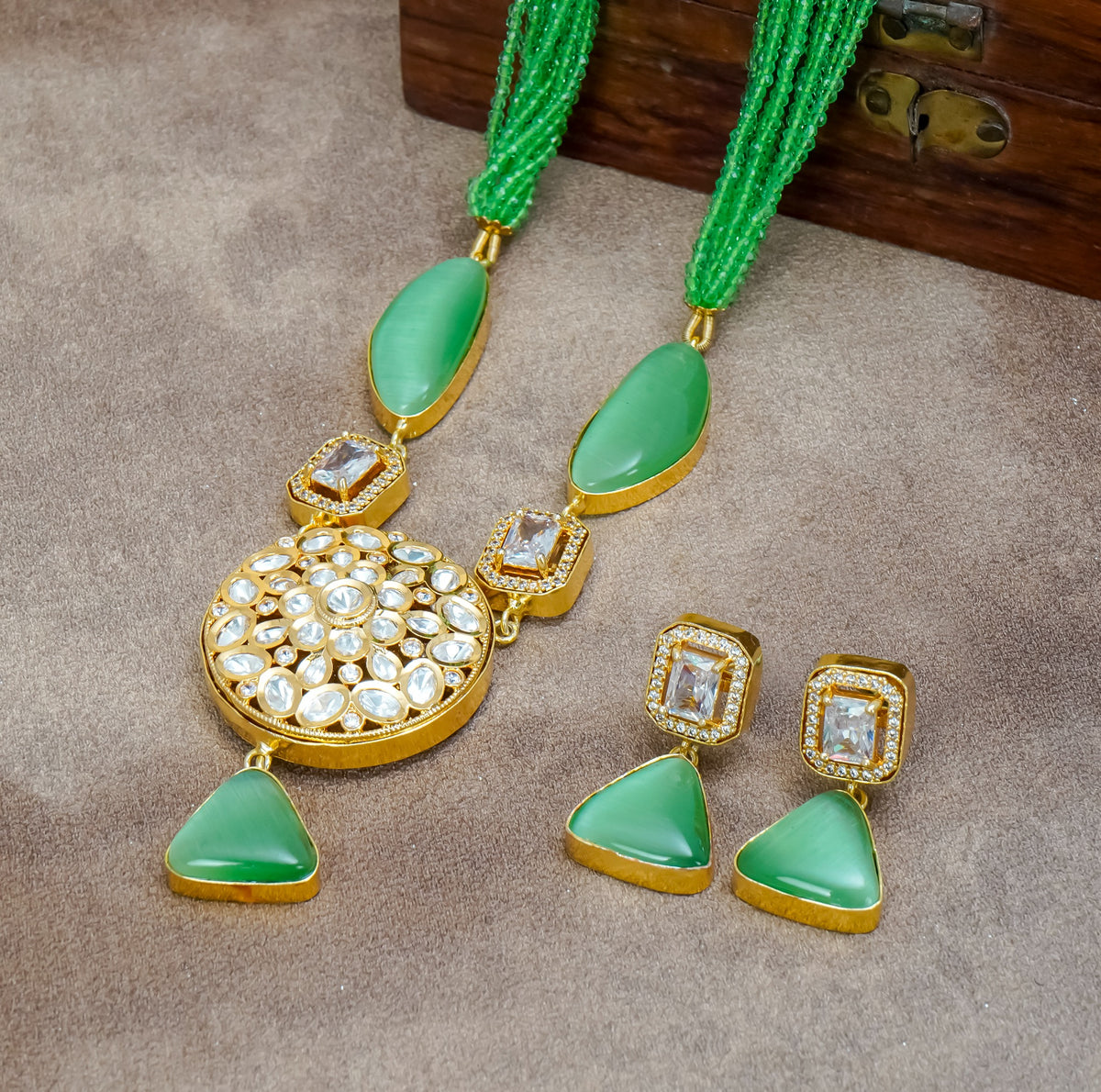 Emerald green beaded gold necklace with matching earrings